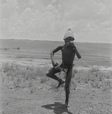 Creator:  Larrabee; Constance Stuart; 1914-2000; Produced:  1941 Phys. Descri  negative : b&w ; 6 x 6 cm. (silver gelatin). photographic print : b&w ; 8 x 10 in. (dupe print).; Subject Geog  South Africa Lesotho   Subjects:  Sotho (Basuto)  Form/Genre  Photographic prints; EEPA 1998-062657; [Summary:  Sotho Herd Boy; 1941. Photographic image of a boy jumping in mid-air. He is wearing a hat and loincloth. Photograph by Constance Stuart Larrabee; 1941. Constance Stuart took photographs in Basutoland (now Lesotho) during her first trip in 1941. In 1947; she returned to Lesotho as an officially accredited photographer. She documented a visit of the British royal family: King George VI; Queen Elizabeth and their daughters Princess Elizabeth and Margaret; to this British Protectorate. She used the occasion to venture into the countryside and captured unique images of rural life among the Sotho people. 
 