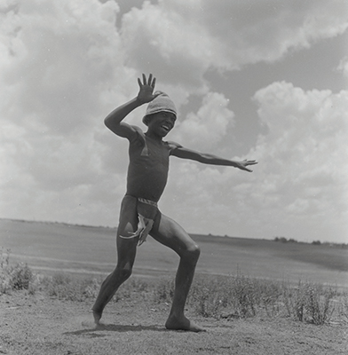 Creator:  Larrabee; Constance Stuart; 1914-2000; Produced:  1941 Phys. Descri  negative : b&w ; 6 x 6 cm. (silver gelatin). photographic print : b&w ; 8 x 10 in. (dupe print).; Subject Geog  South Africa Lesotho   Subjects:  Sotho (Basuto)  Form/Genre  Photographic prints; EEPA 1998-062657; [Summary:  Sotho Herd Boy; 1941. Photographic image of a boy jumping in mid-air. He is wearing a hat and loincloth. Photograph by Constance Stuart Larrabee; 1941. Constance Stuart took photographs in Basutoland (now Lesotho) during her first trip in 1941. In 1947; she returned to Lesotho as an officially accredited photographer. She documented a visit of the British royal family: King George VI; Queen Elizabeth and their daughters Princess Elizabeth and Margaret; to this British Protectorate. She used the occasion to venture into the countryside and captured unique images of rural life among the Sotho people. 
 