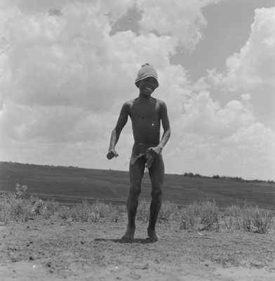 Creator:  Larrabee; Constance Stuart; 1914-2000; Produced:  1941 Phys. Descri  negative : b&w ; 6 x 6 cm. (silver gelatin). photographic print : b&w ; 8 x 10 in. (dupe print).; Subject Geog  South Africa Lesotho   Subjects:  Sotho (Basuto)  Form/Genre  Photographic prints; EEPA 1998-062657; [Summary:  Sotho Herd Boy; 1941. Photographic image of a boy jumping in mid-air. He is wearing a hat and loincloth. Photograph by Constance Stuart Larrabee; 1941. Constance Stuart took photographs in Basutoland (now Lesotho) during her first trip in 1941. In 1947; she returned to Lesotho as an officially accredited photographer. She documented a visit of the British royal family: King George VI; Queen Elizabeth and their daughters Princess Elizabeth and Margaret; to this British Protectorate. She used the occasion to venture into the countryside and captured unique images of rural life among the Sotho people. 
 