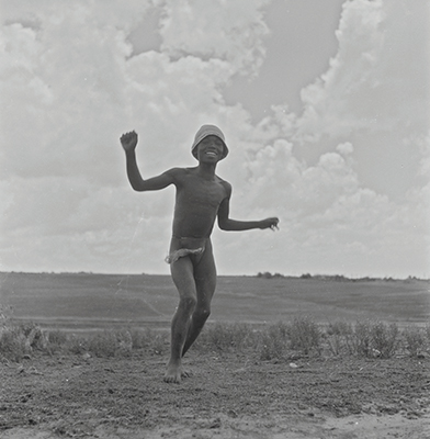 Creator:  Larrabee; Constance Stuart; 1914-2000; Produced:  1941 Phys. Descri  negative : b&w ; 6 x 6 cm. (silver gelatin). photographic print : b&w ; 8 x 10 in. (dupe print).; Subject Geog  South Africa Lesotho   Subjects:  Sotho (Basuto)  Form/Genre  Photographic prints; EEPA 1998-062657; [Summary:  Sotho Herd Boy; 1941. Photographic image of a boy jumping in mid-air. He is wearing a hat and loincloth. Photograph by Constance Stuart Larrabee; 1941. Constance Stuart took photographs in Basutoland (now Lesotho) during her first trip in 1941. In 1947; she returned to Lesotho as an officially accredited photographer. She documented a visit of the British royal family: King George VI; Queen Elizabeth and their daughters Princess Elizabeth and Margaret; to this British Protectorate. She used the occasion to venture into the countryside and captured unique images of rural life among the Sotho people. 
 
